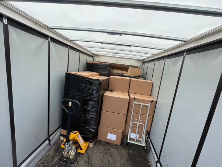 Palletised boxes secured inside an ELH Haulage vehicle